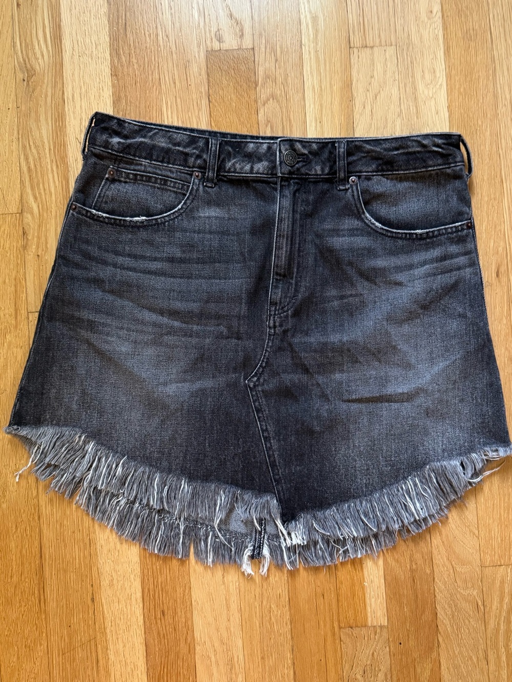 We The Free Washed Black Denim Skirt with Fringe